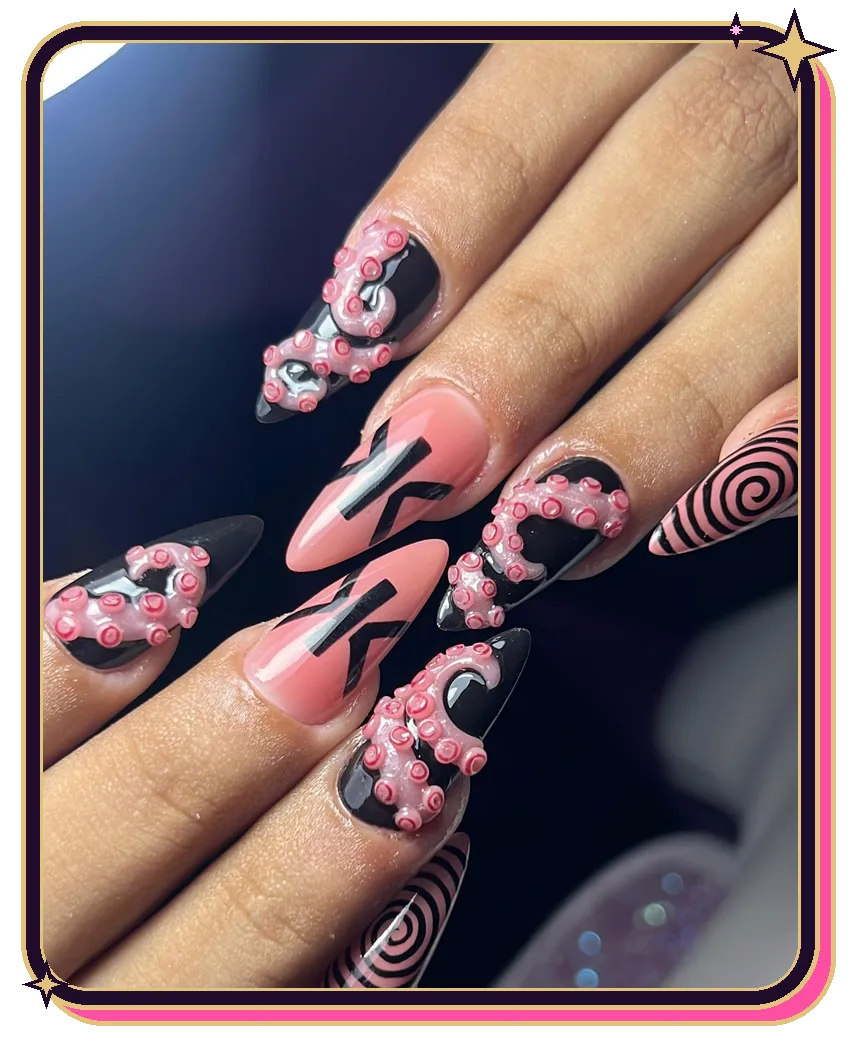Uñas stiletto negras y rosadas con tentáculos en relieve 3D y espirales